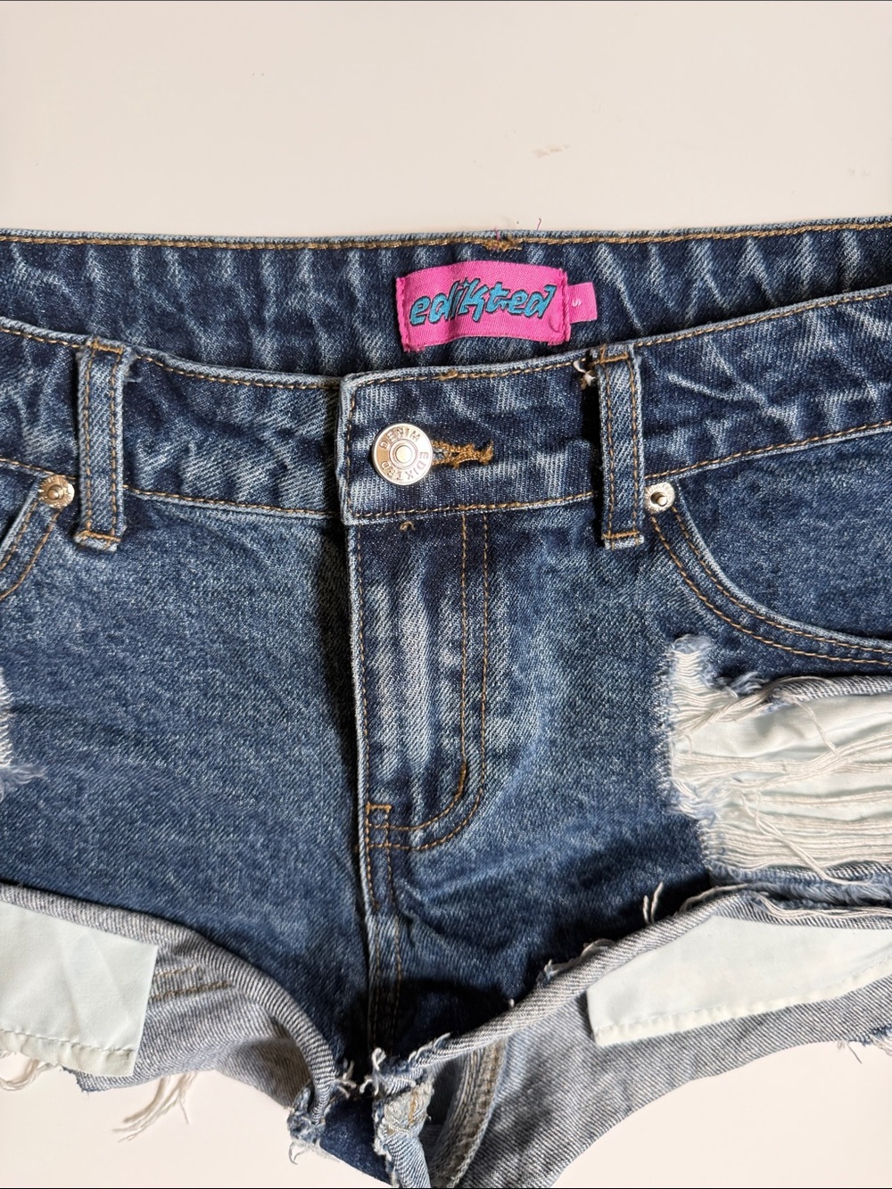 Edikted Dark Blue Distressed Denim Shorts with Pink Logo Tag